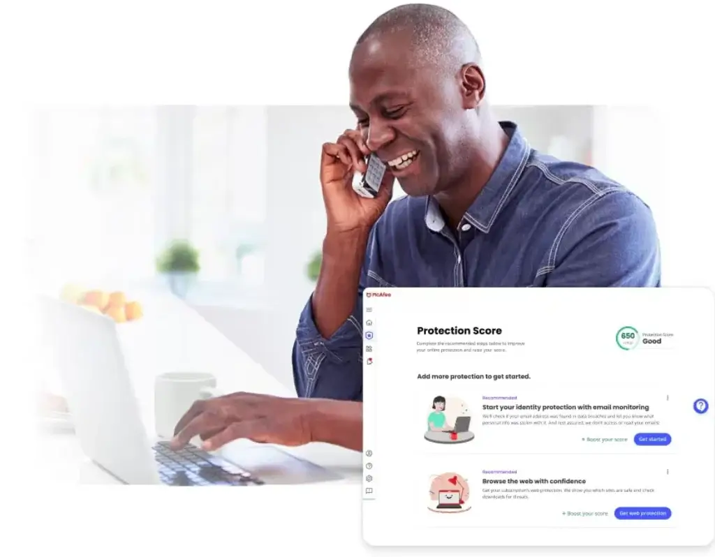 Person reviewing McAfee Protection Score and identity monitoring dashboard