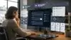 what is aeo - Marketer reviewing AI-generated answers for AEO strategy